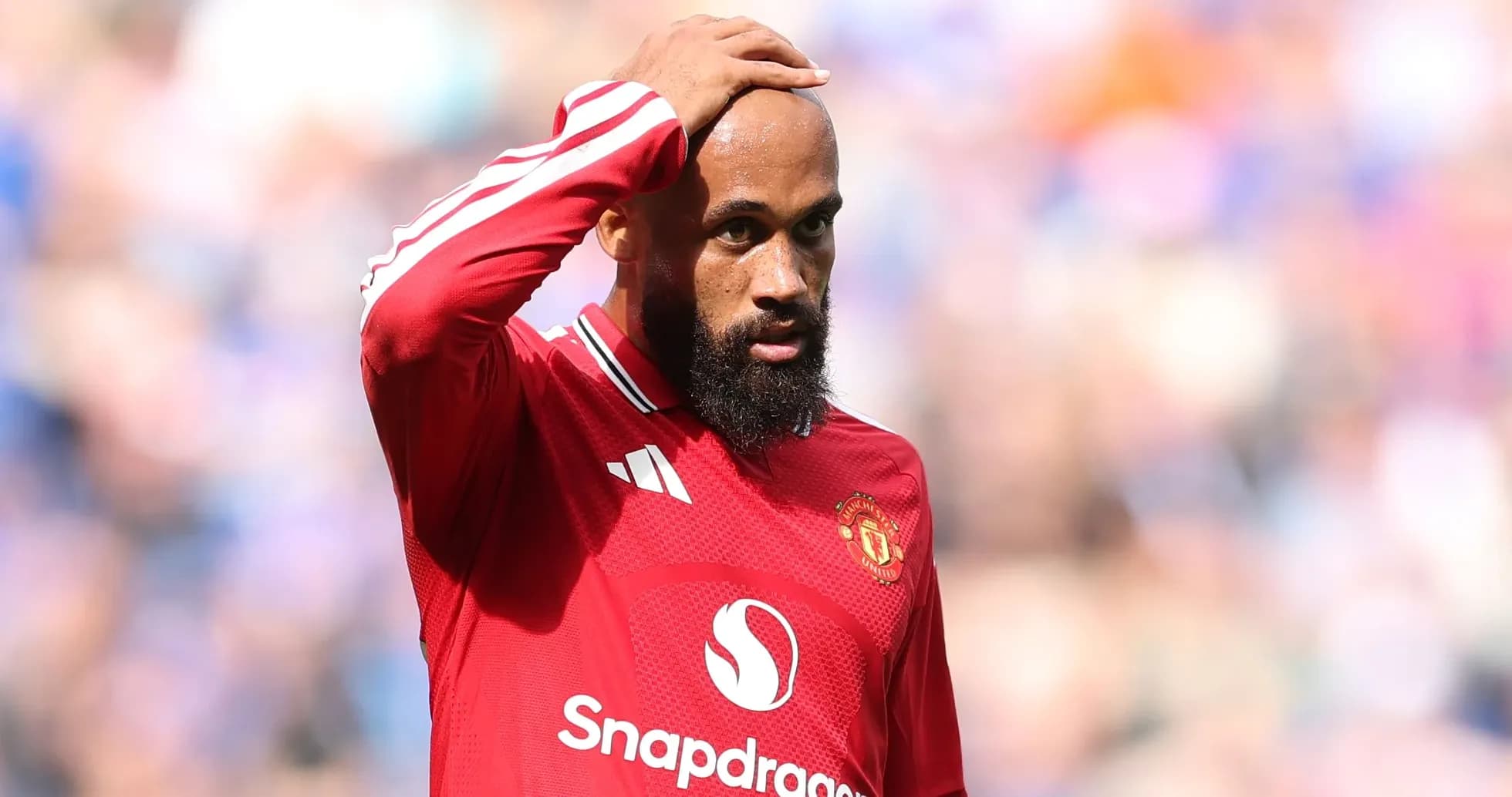 Joueur de Manchester United avec le maillot rouge