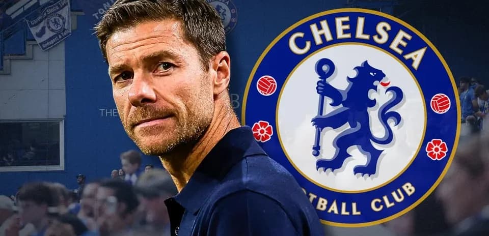 Entraîneur devant le logo de Chelsea FC