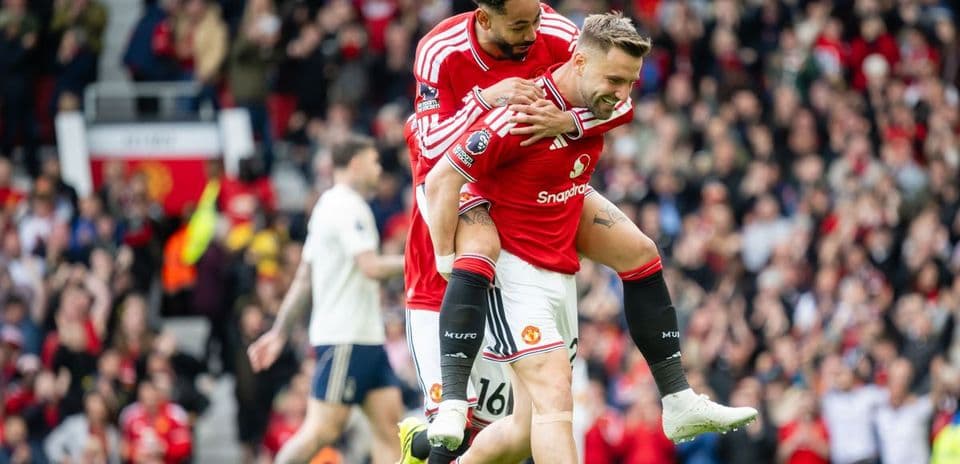 Joueurs de Manchester United célébrant un but