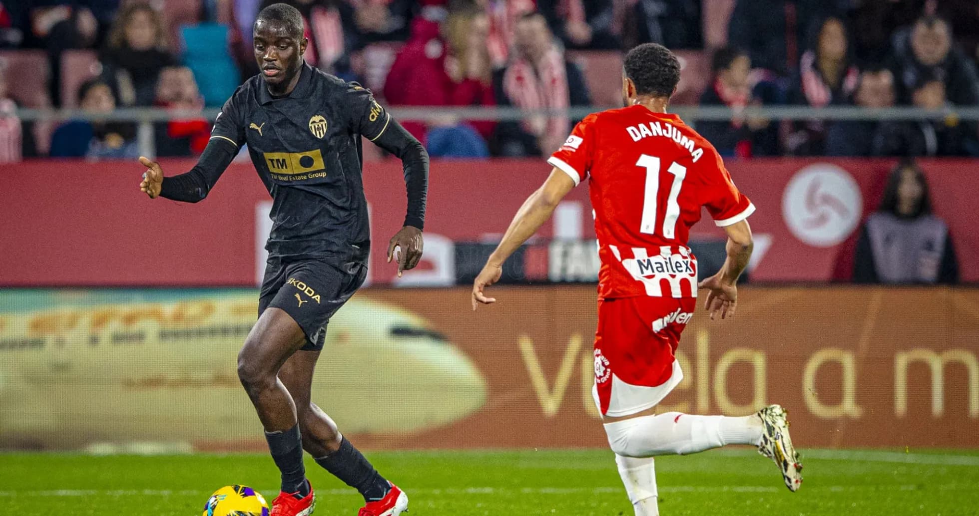 Joueur de Valence en action contre Girona