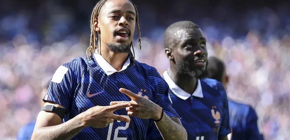 Joueurs de l'équipe de France célébrant un moment de jeu