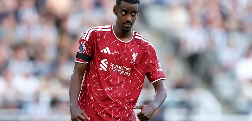 Joueur de Liverpool en action sur le terrain