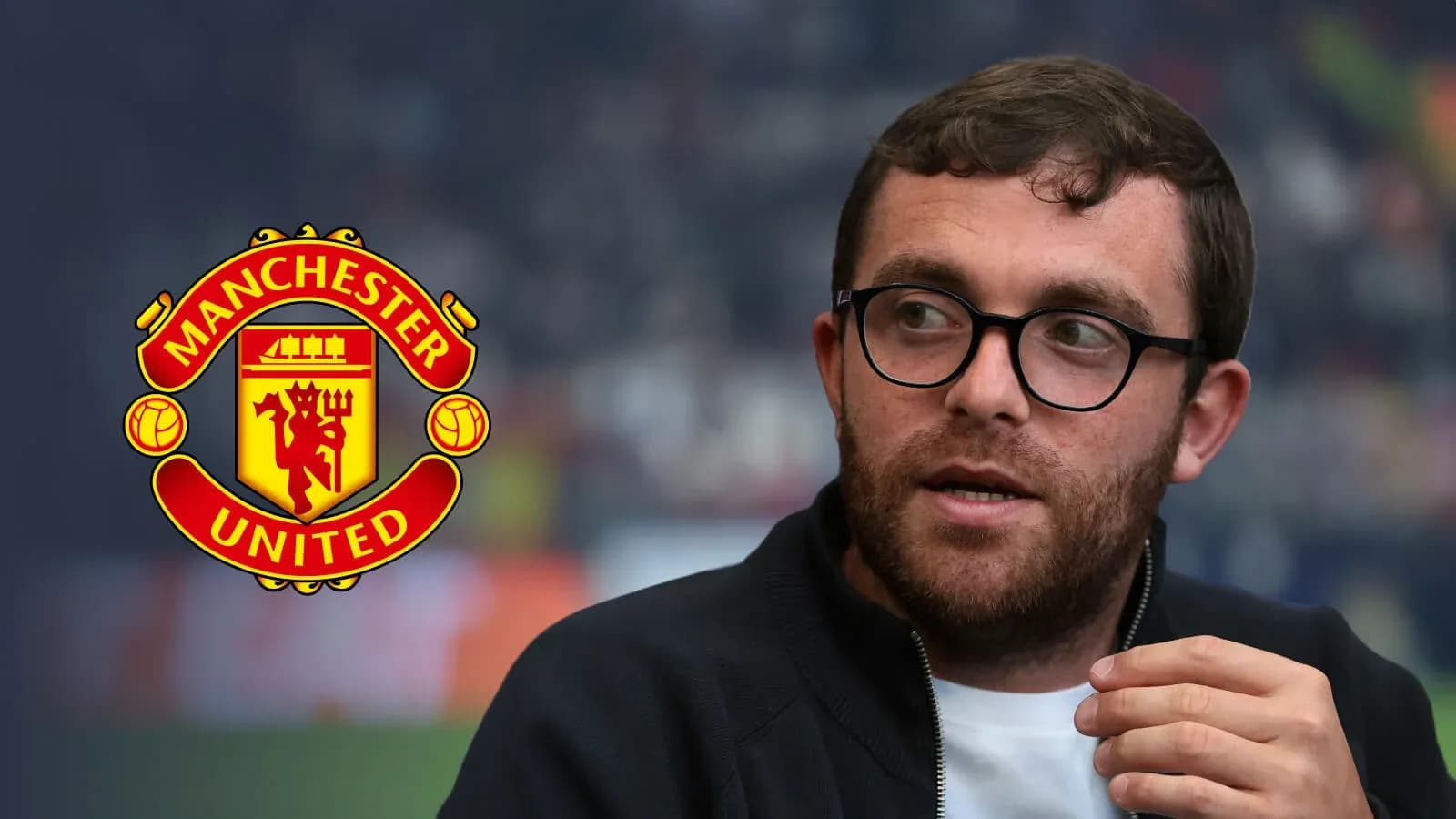 Person speaking with Manchester United logo in background Person speaking with Manchester United logo in background