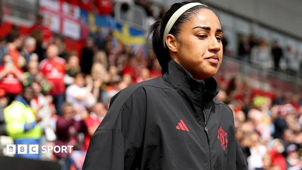 Joueuse de Manchester United entrant sur le terrain Joueuse de Manchester United entrant sur le terrain