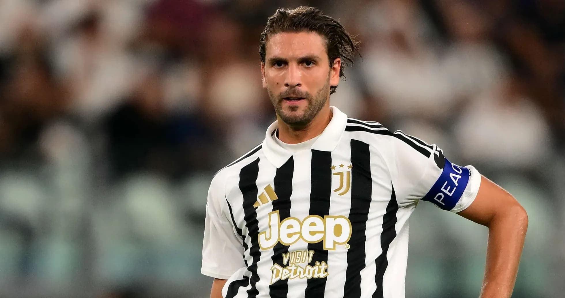 Joueur de la Juventus en action sur le terrain Joueur de la Juventus en action sur le terrain