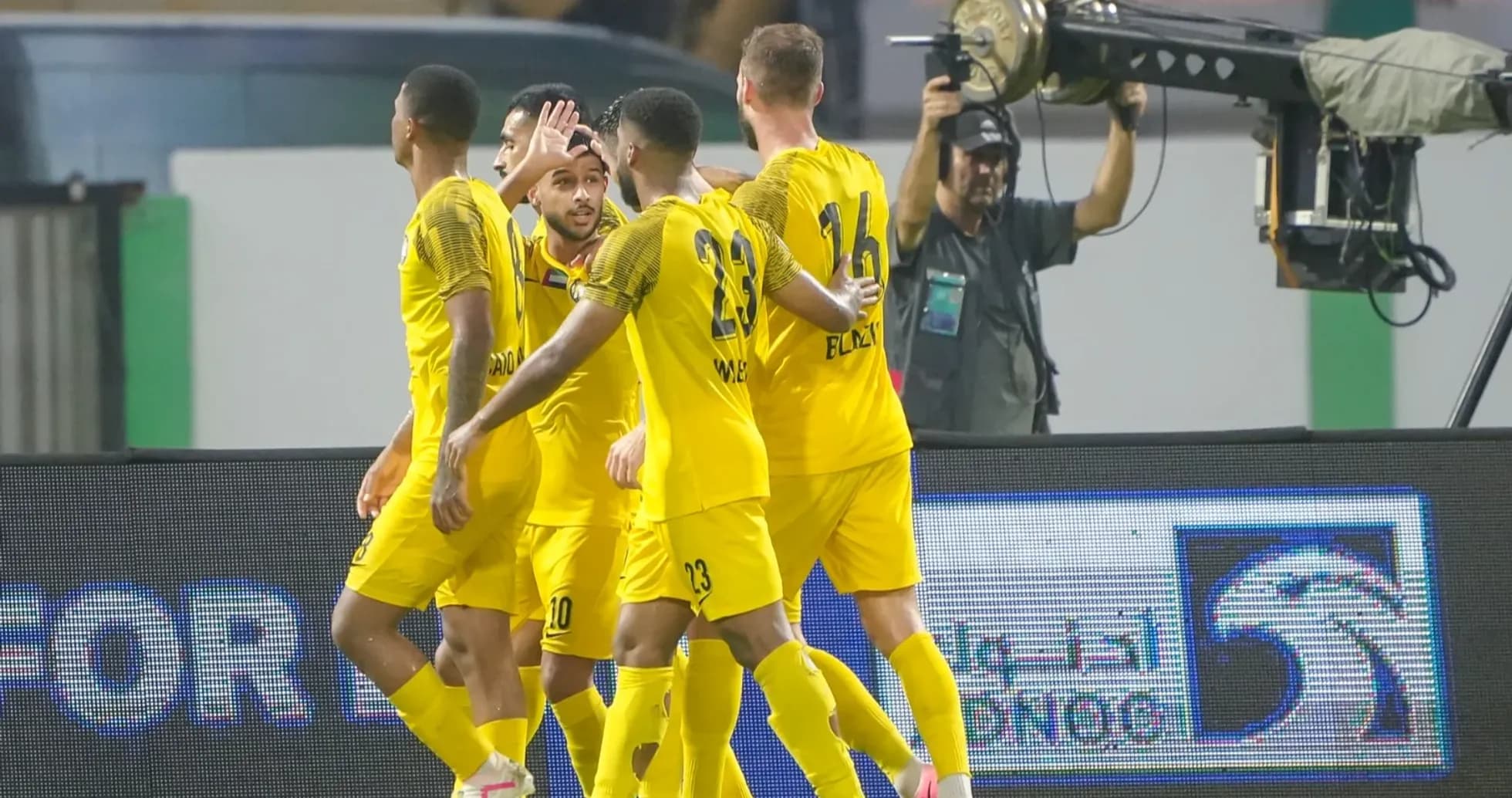 Joueurs célébrant un but lors du match Joueurs célébrant un but lors du match