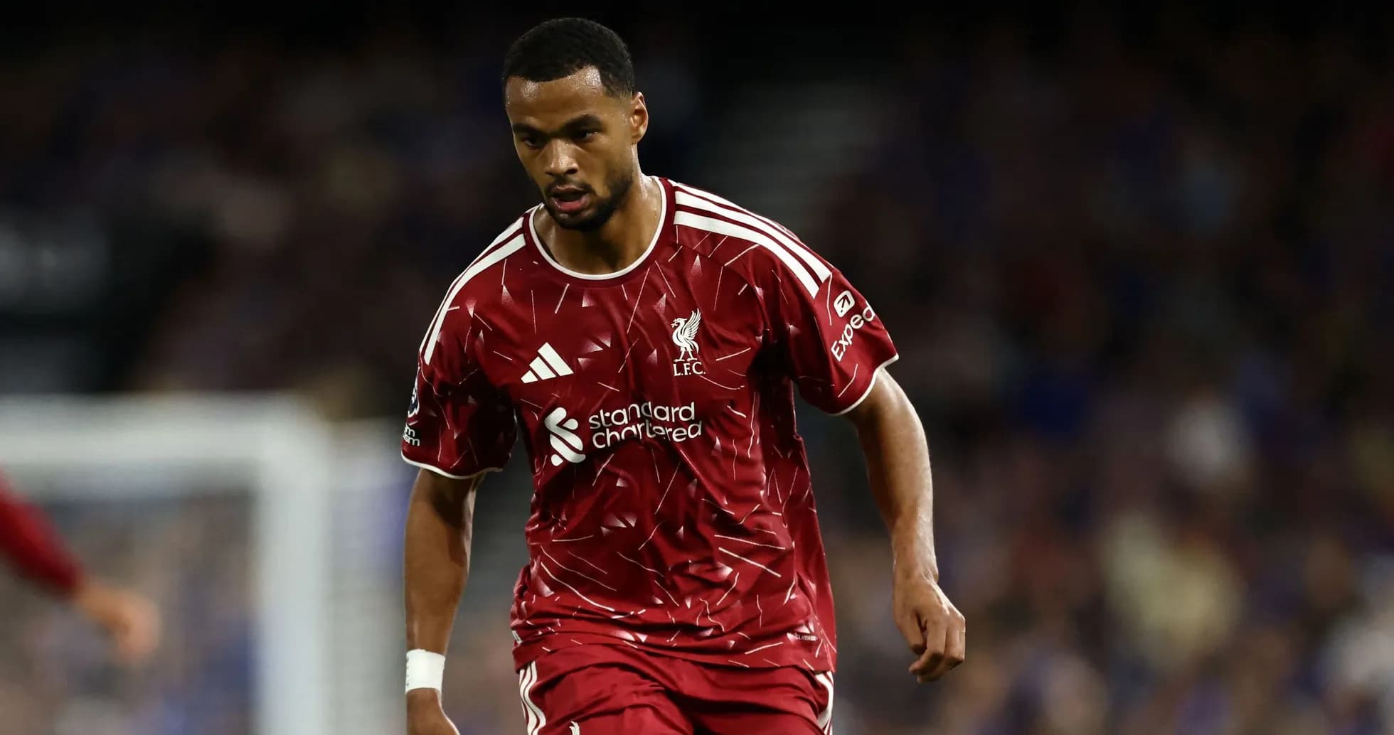 Joueur de Liverpool en action sur le terrain Joueur de Liverpool en action sur le terrain