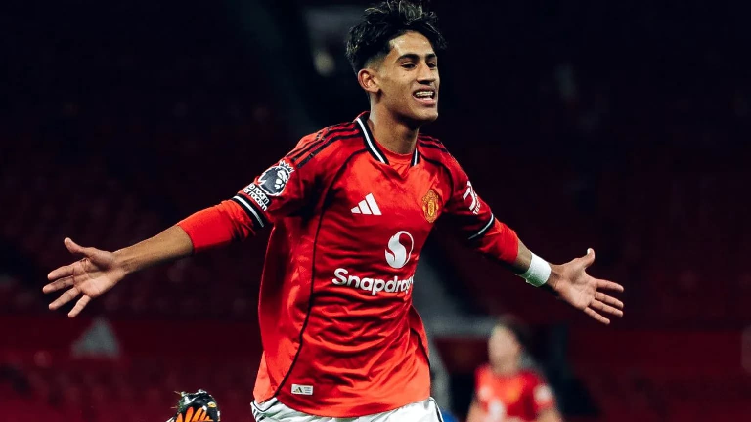 Joueur de Manchester United célébrant un but Joueur de Manchester United célébrant un but