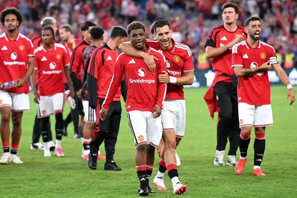 Joueurs de Manchester United célébrant après le match Joueurs de Manchester United célébrant après le match