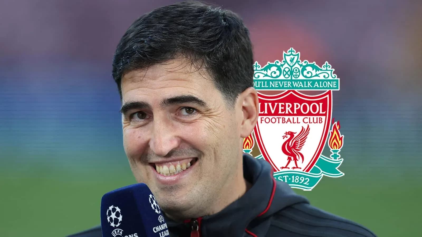 Person smiling with Liverpool FC logo in background Person smiling with Liverpool FC logo in background