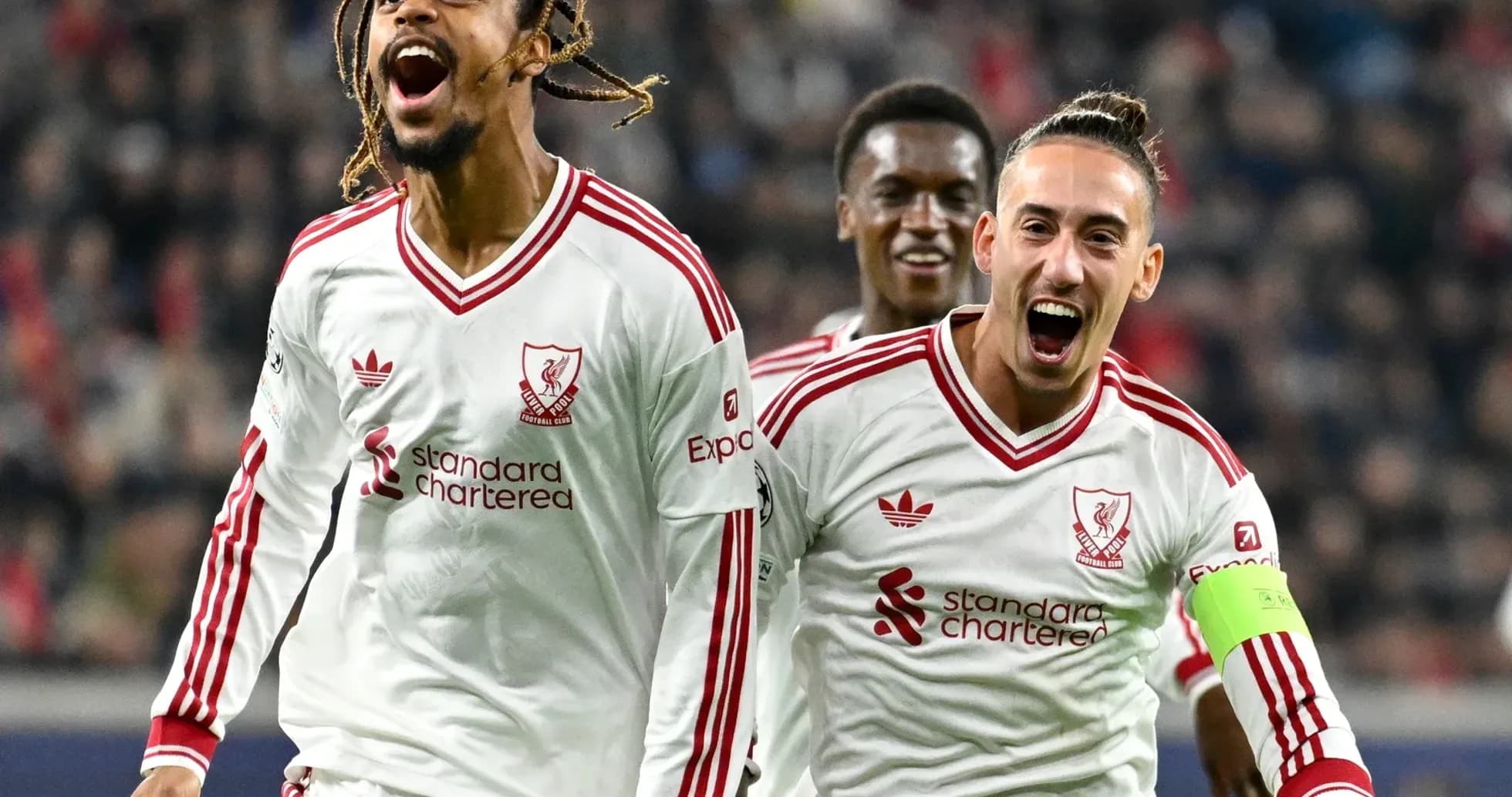 Joueurs de Liverpool célébrant un but Joueurs de Liverpool célébrant un but