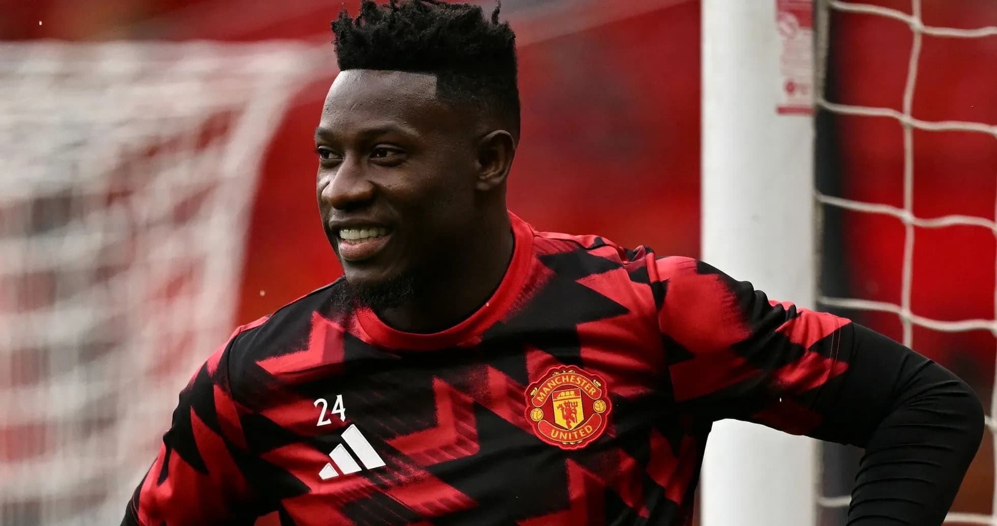 Gardien de but de Manchester United souriant Gardien de but de Manchester United souriant