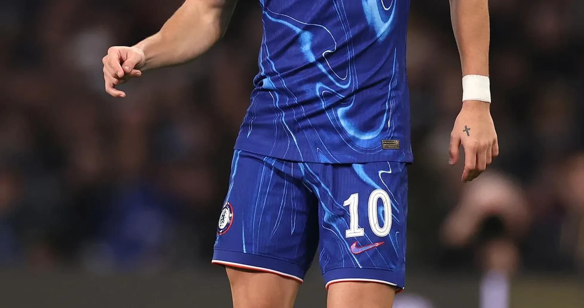 Joueur de Chelsea en action sur le terrain Joueur de Chelsea en action sur le terrain