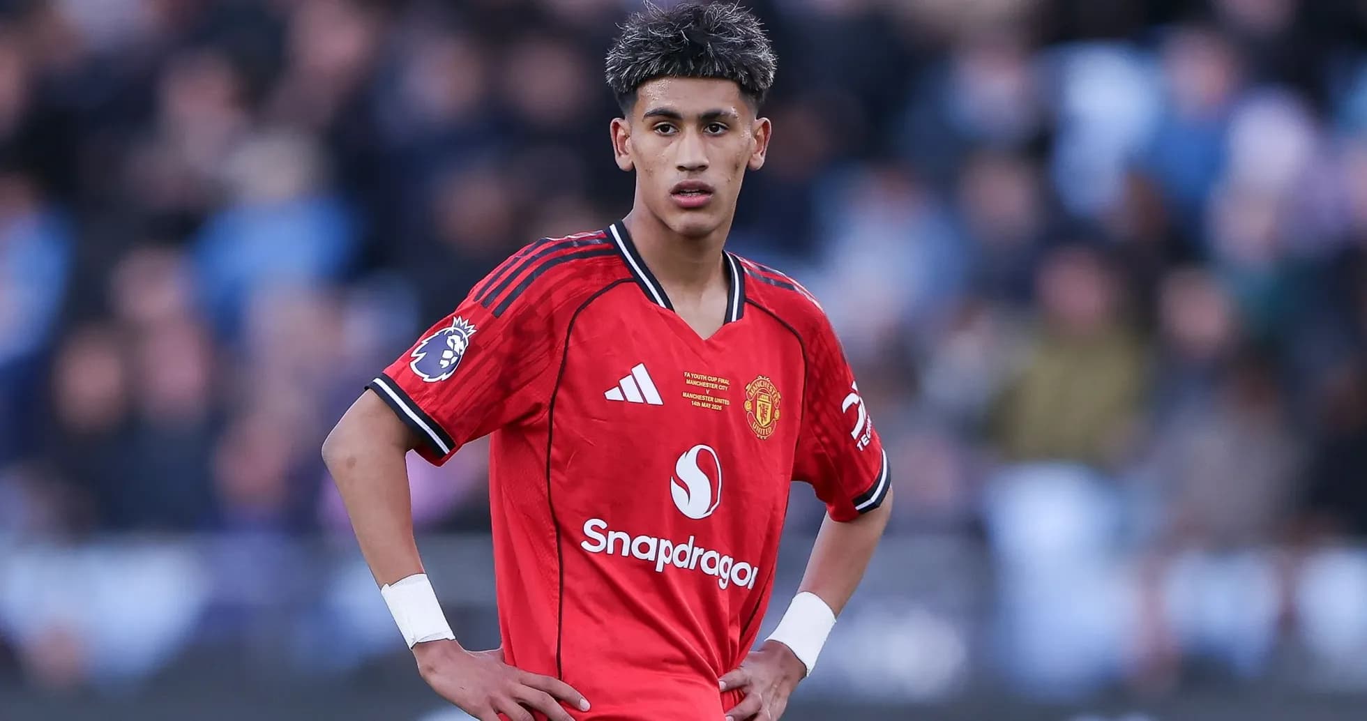 Joueur de Manchester United en action sur le terrain Joueur de Manchester United en action sur le terrain