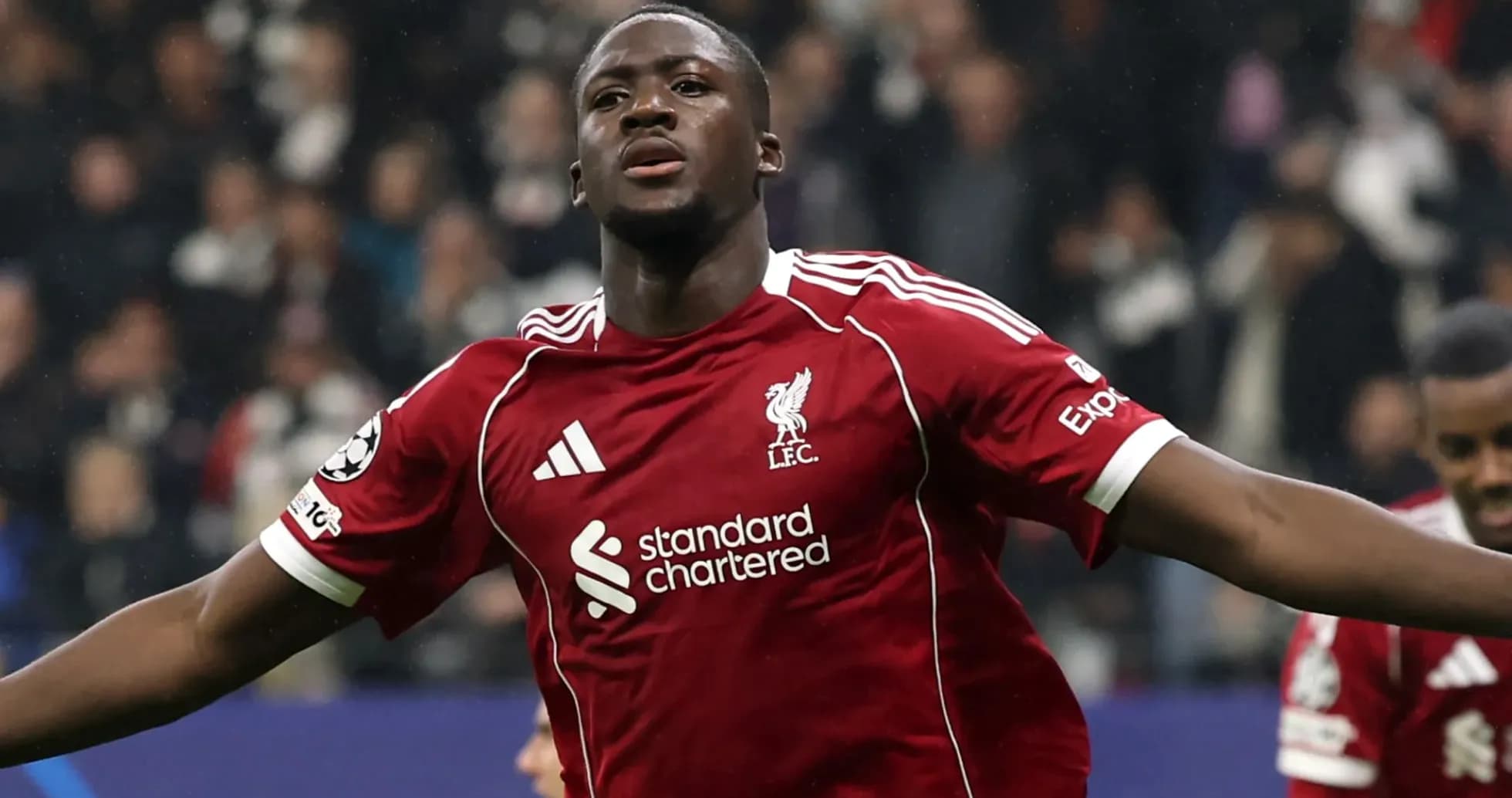 Joueur de Liverpool célébrant un but lors d'un match Joueur de Liverpool célébrant un but lors d'un match