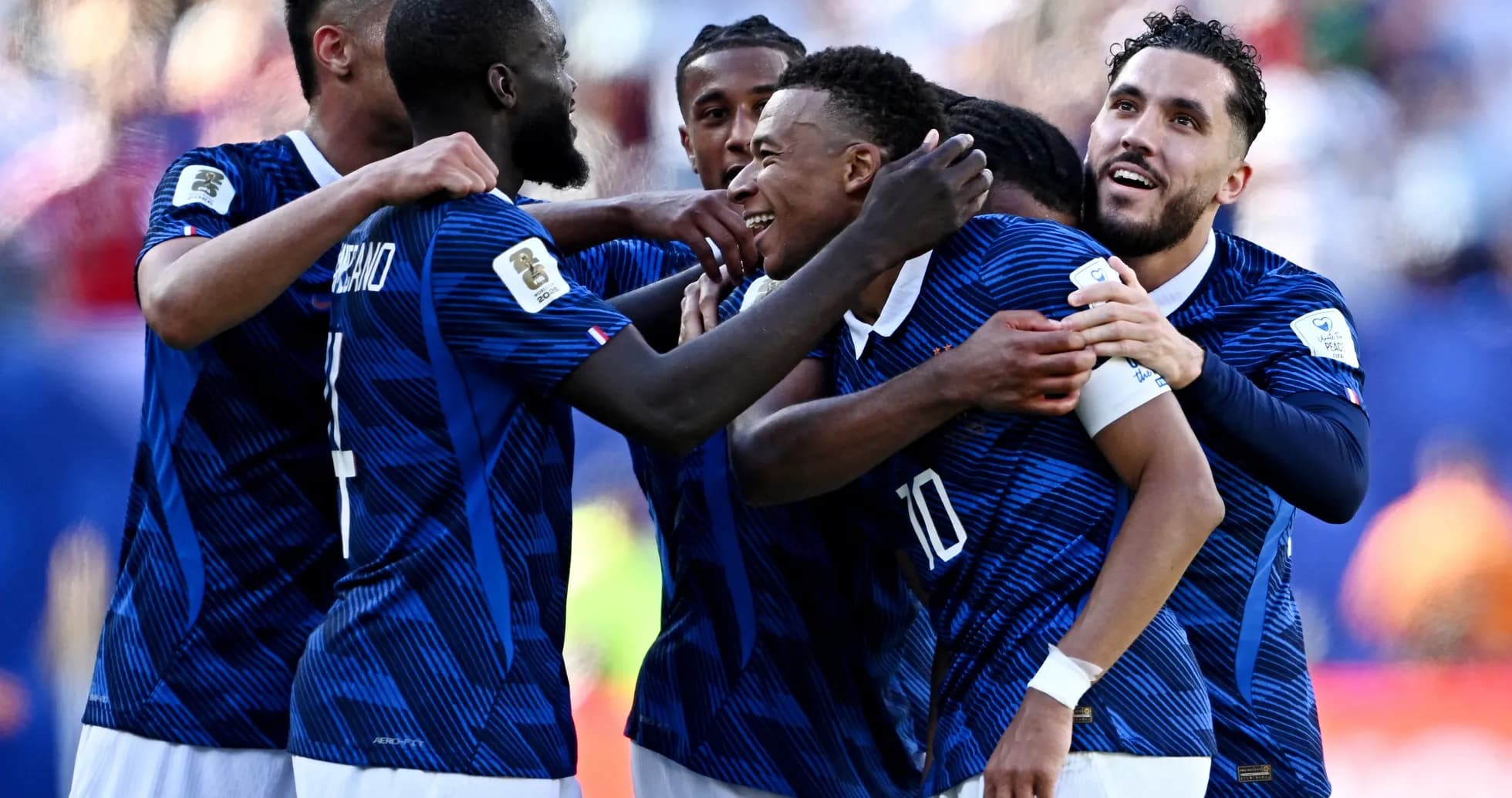 Joueurs de France célébrant un but Joueurs de France célébrant un but