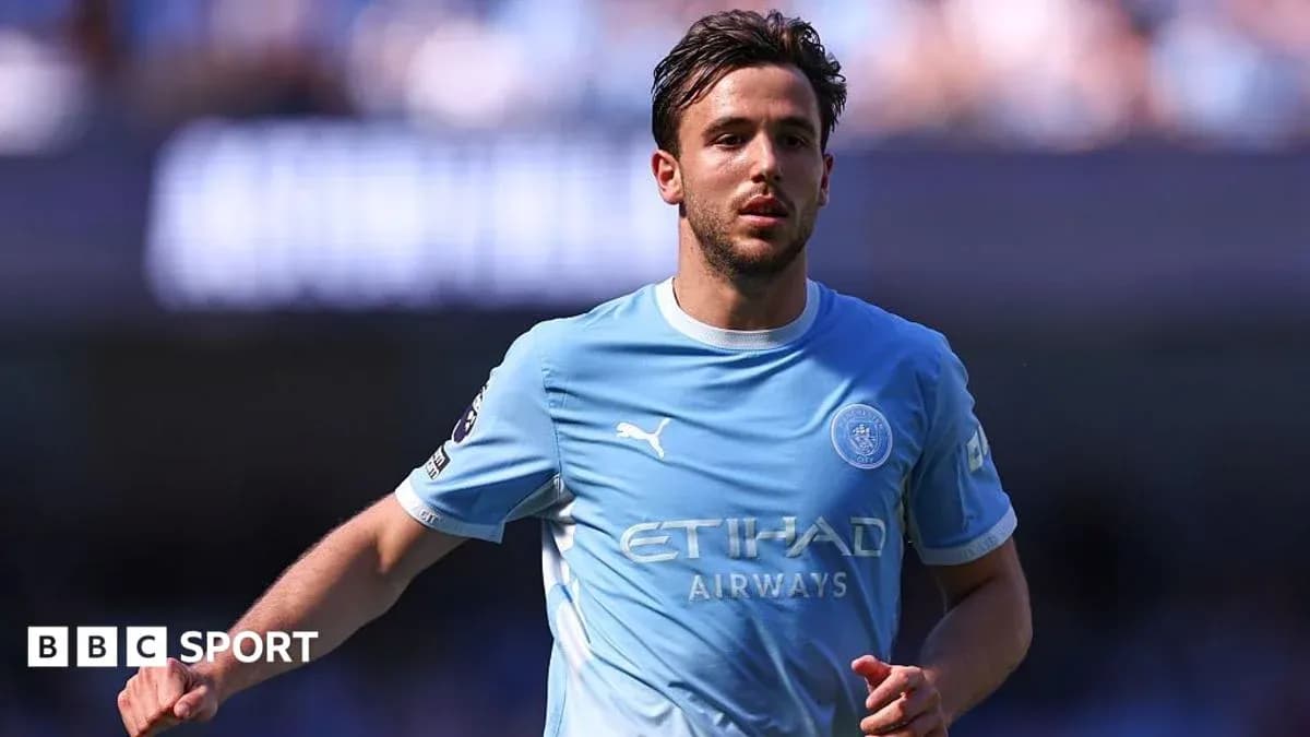 Joueur de Manchester City en action sur le terrain Joueur de Manchester City en action sur le terrain