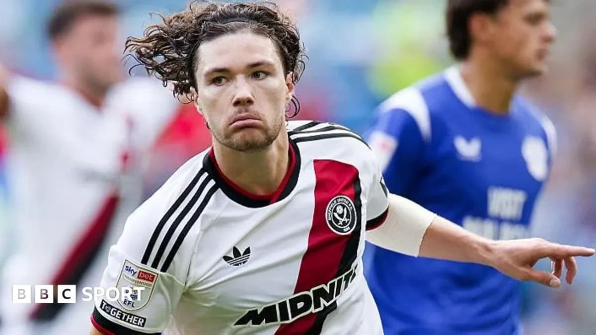 Joueur célébrant un but lors d'un match Joueur célébrant un but lors d'un match