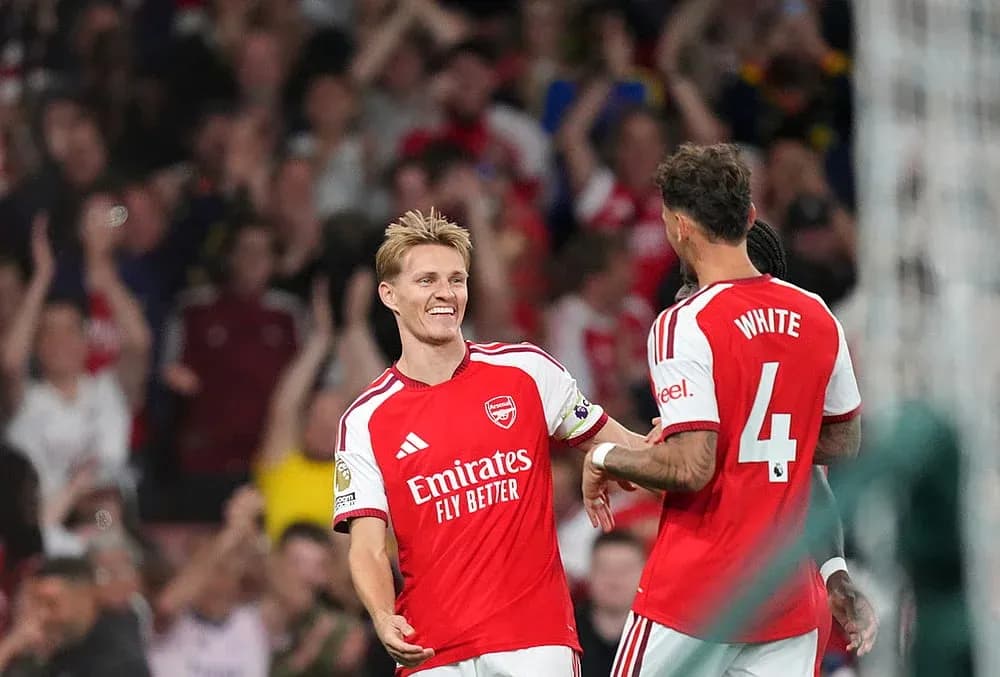Joueurs d'Arsenal célébrant un but Joueurs d'Arsenal célébrant un but