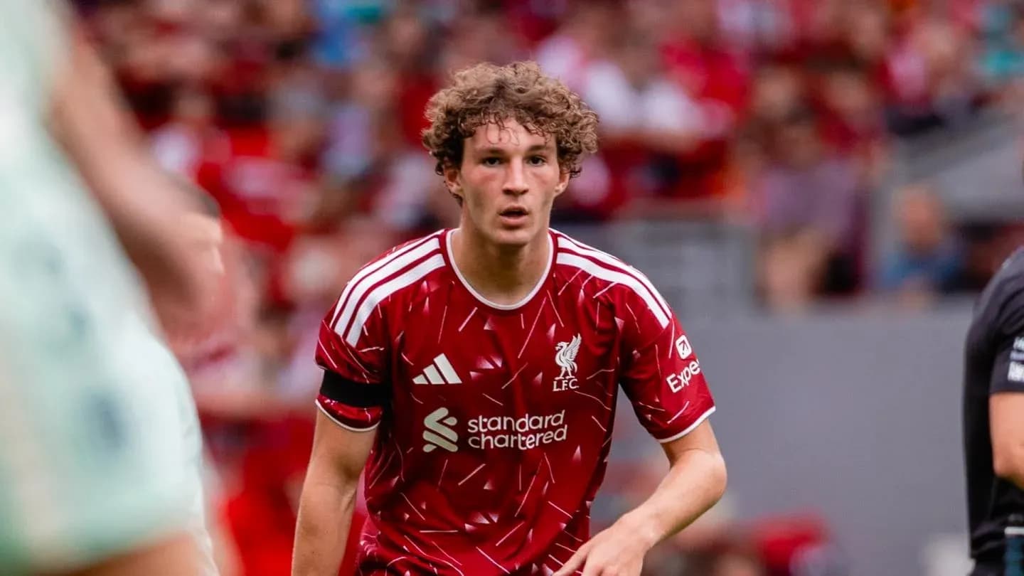 Joueur de Liverpool en action sur le terrain Joueur de Liverpool en action sur le terrain