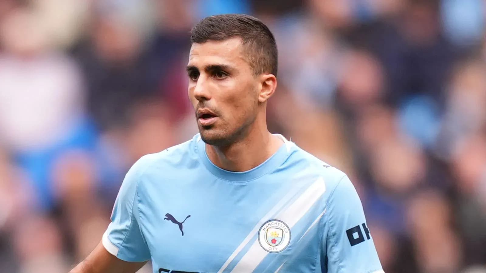Joueur de Manchester City en action sur le terrain Joueur de Manchester City en action sur le terrain