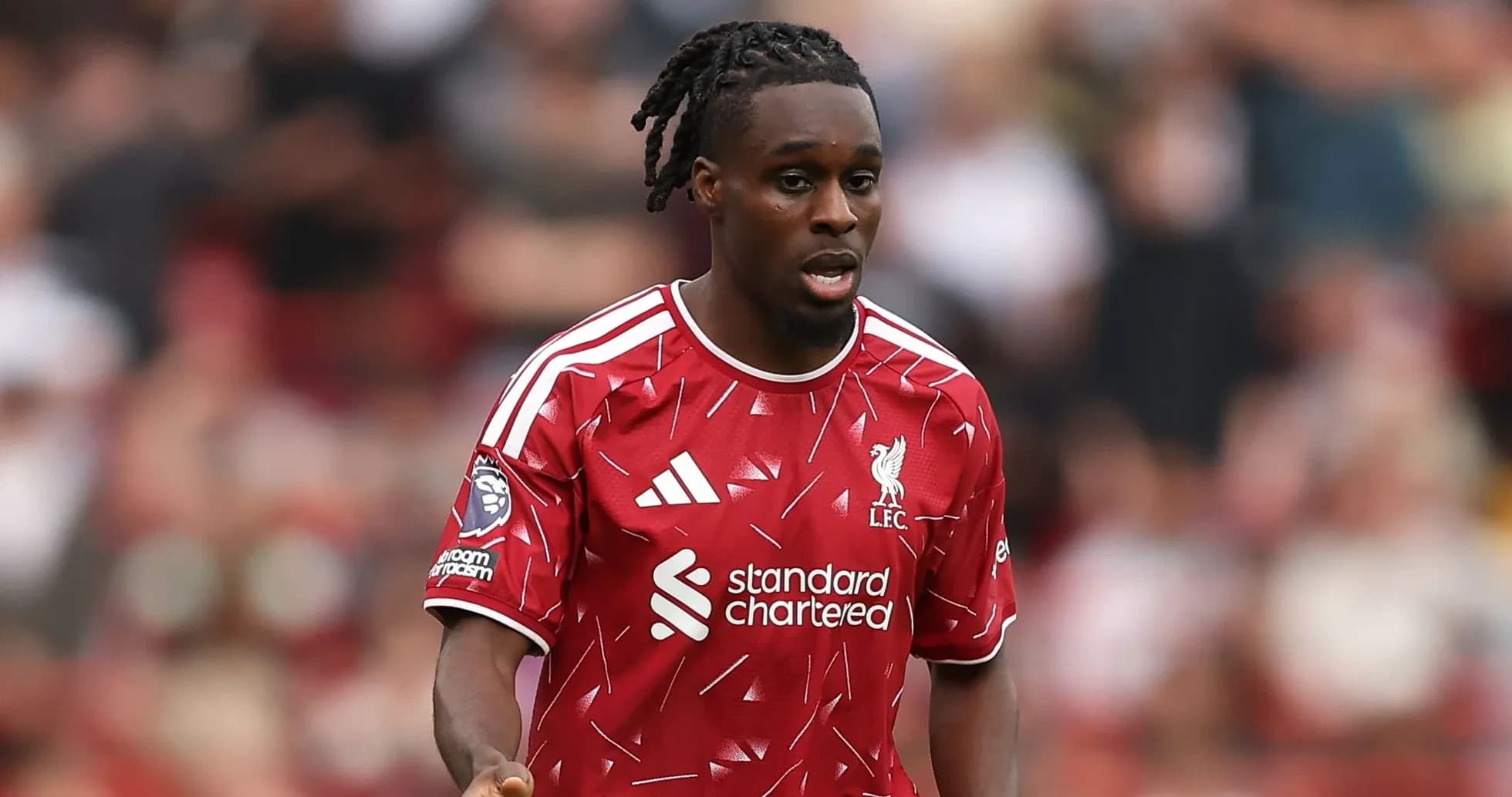 Joueur de Liverpool en action sur le terrain Joueur de Liverpool en action sur le terrain