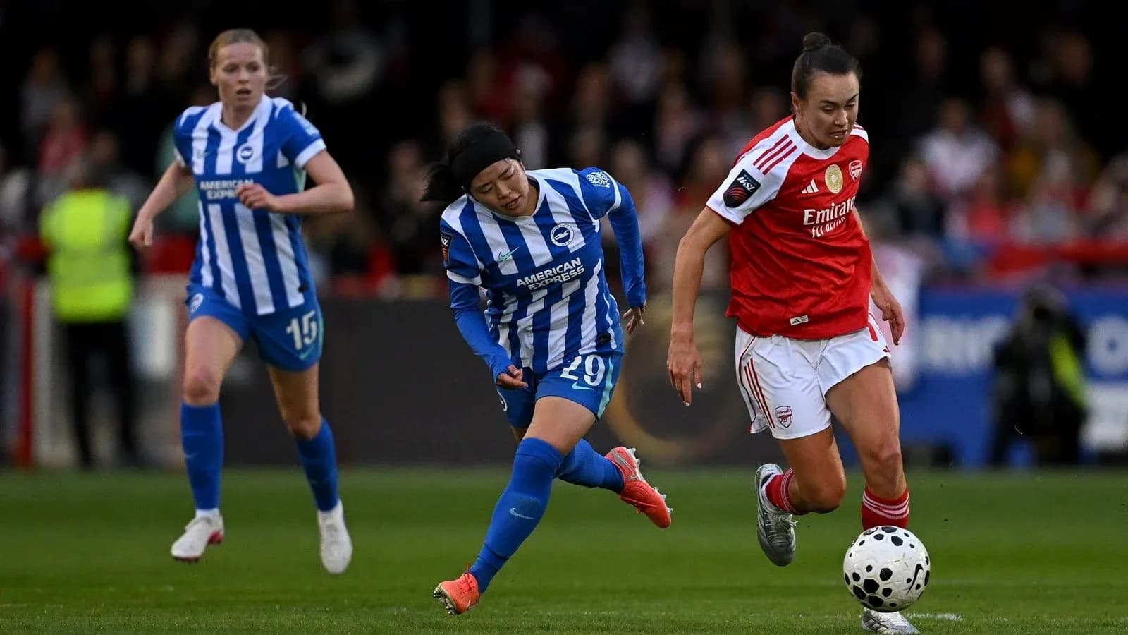 Joueuses d'Arsenal et Brighton en action sur le terrain Joueuses d'Arsenal et Brighton en action sur le terrain