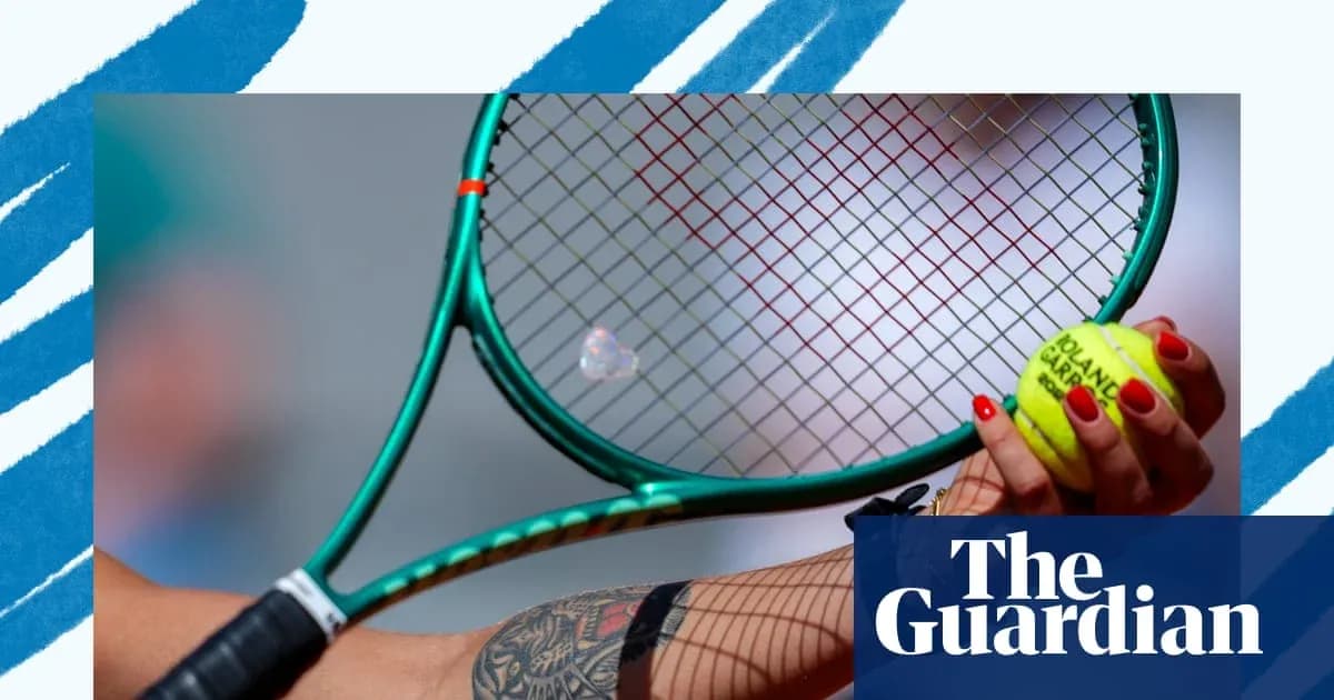 Mainly a tennis racket and ball held by player Mainly a tennis racket and ball held by player