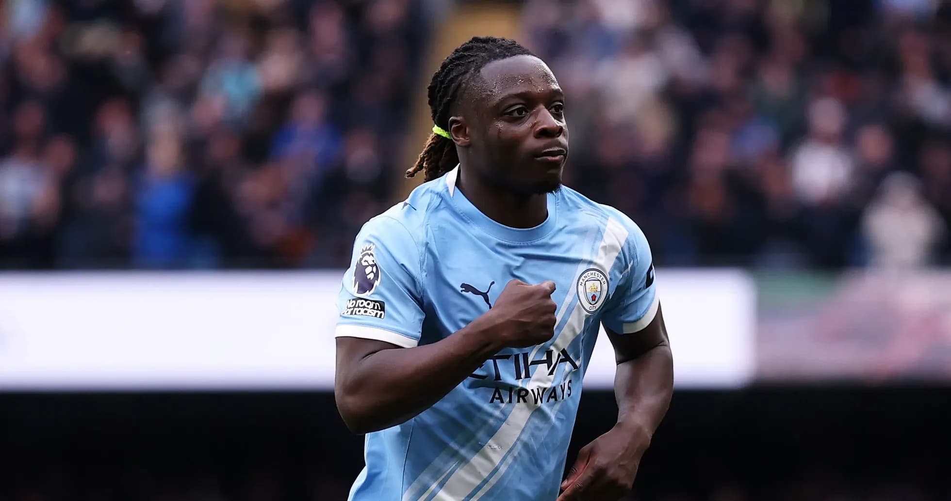 Joueur de Manchester City célébrant un but Joueur de Manchester City célébrant un but