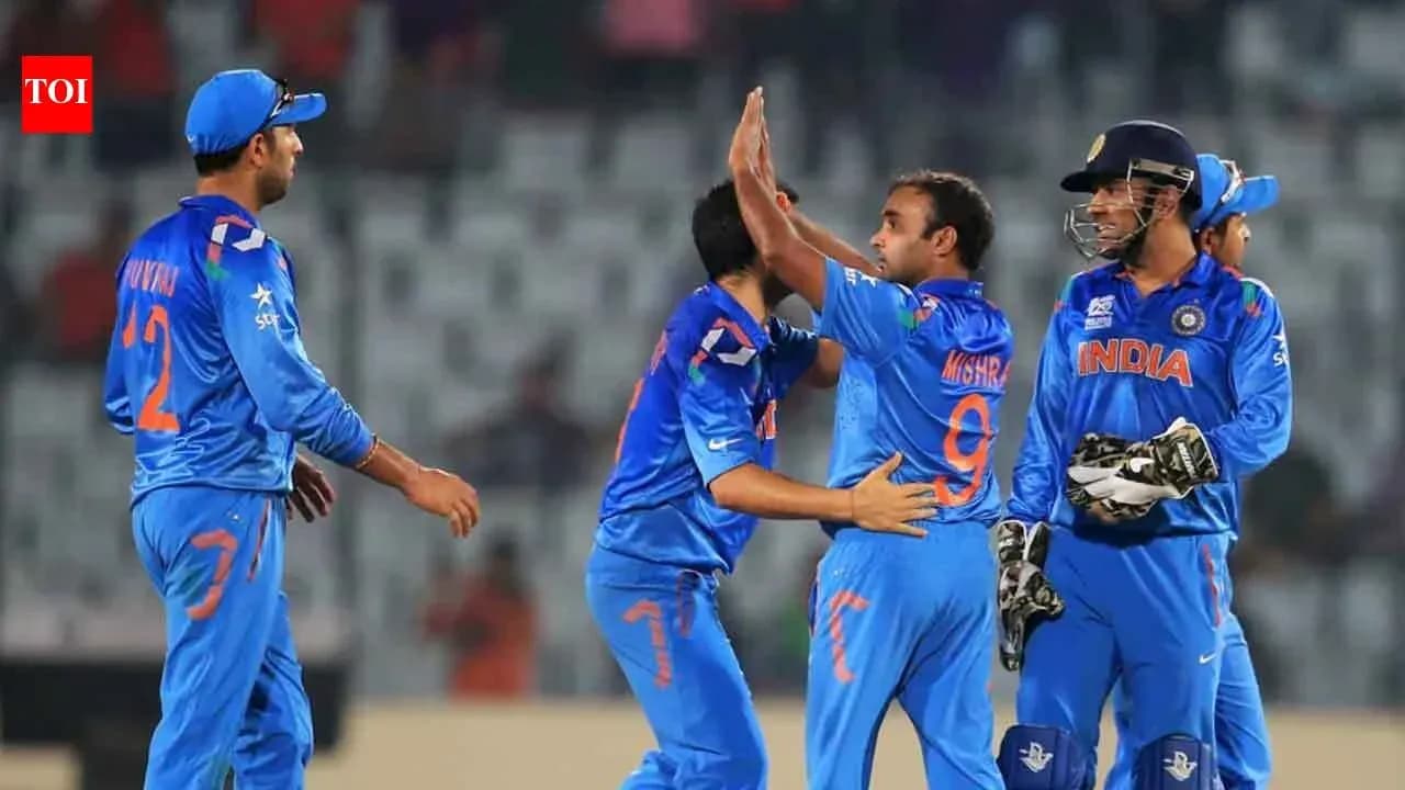 Équipe indienne célébrant un wicket lors d'un match Équipe indienne célébrant un wicket lors d'un match
