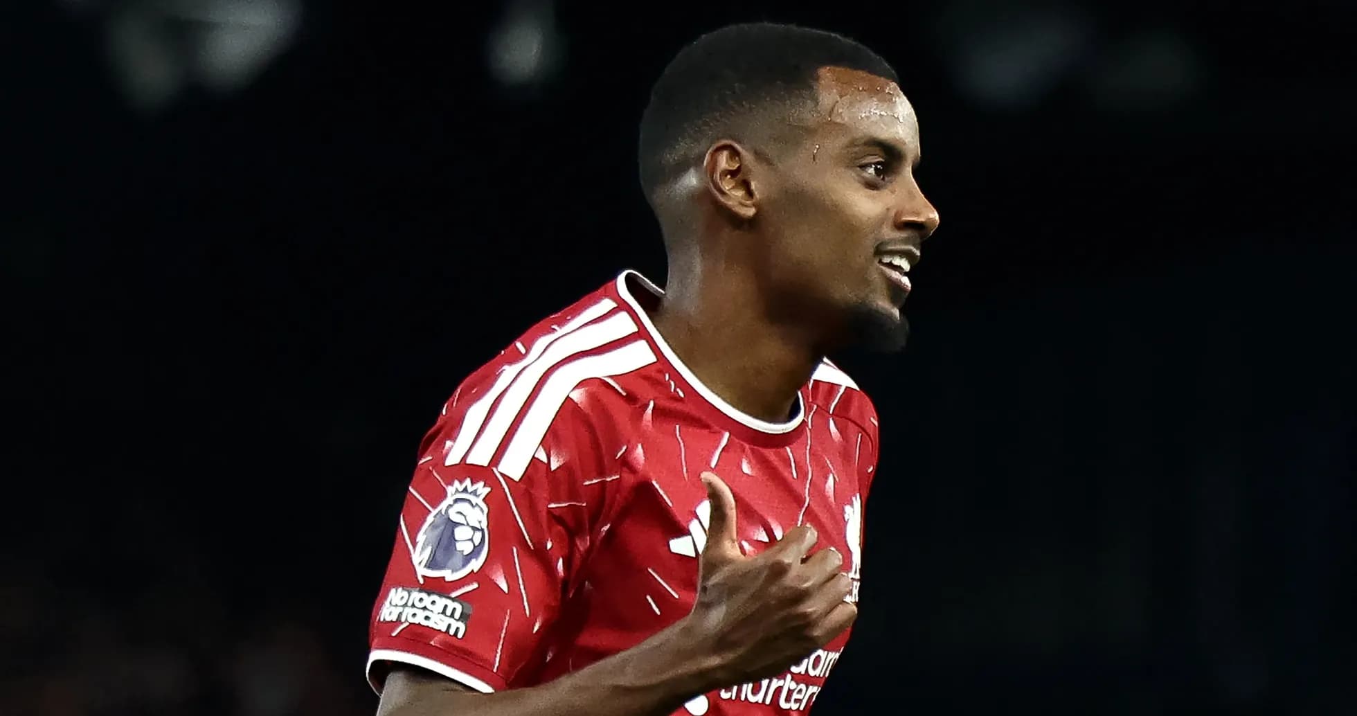 Joueur de Liverpool célébrant un but Joueur de Liverpool célébrant un but
