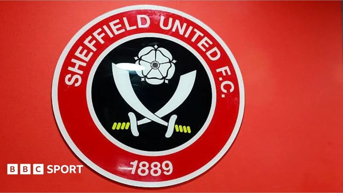 Logo de Sheffield United F.C. sur fond rouge Logo de Sheffield United F.C. sur fond rouge