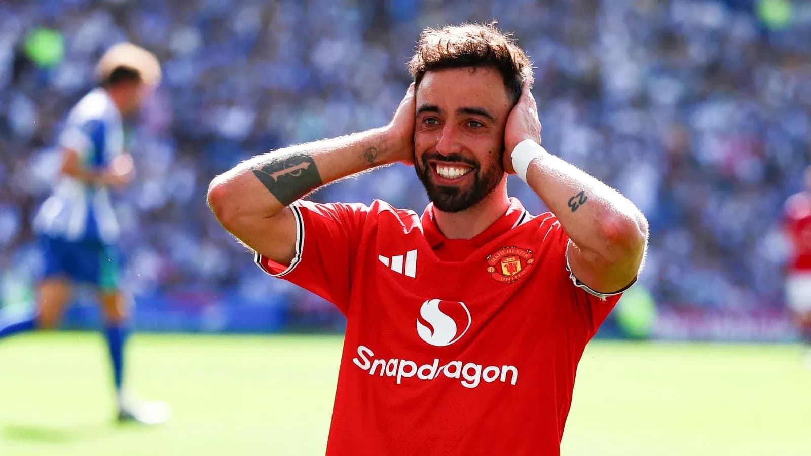 Joueur de Manchester United célébrant un but Joueur de Manchester United célébrant un but