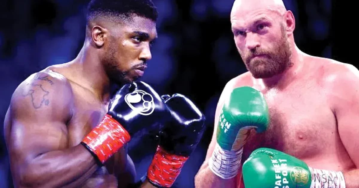 Anthony Joshua and Tyson Fury in boxing stance Anthony Joshua and Tyson Fury in boxing stance