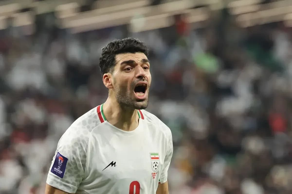 Joueur iranien célébrant pendant le match Joueur iranien célébrant pendant le match