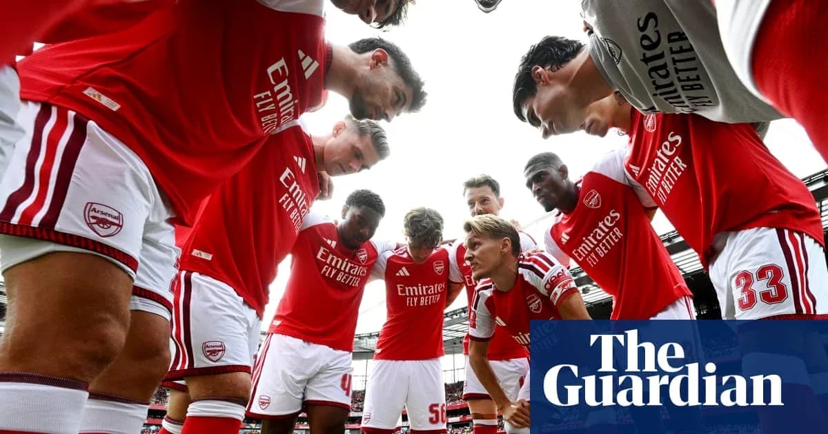 Joueurs d'Arsenal en cercle avant le match Joueurs d'Arsenal en cercle avant le match