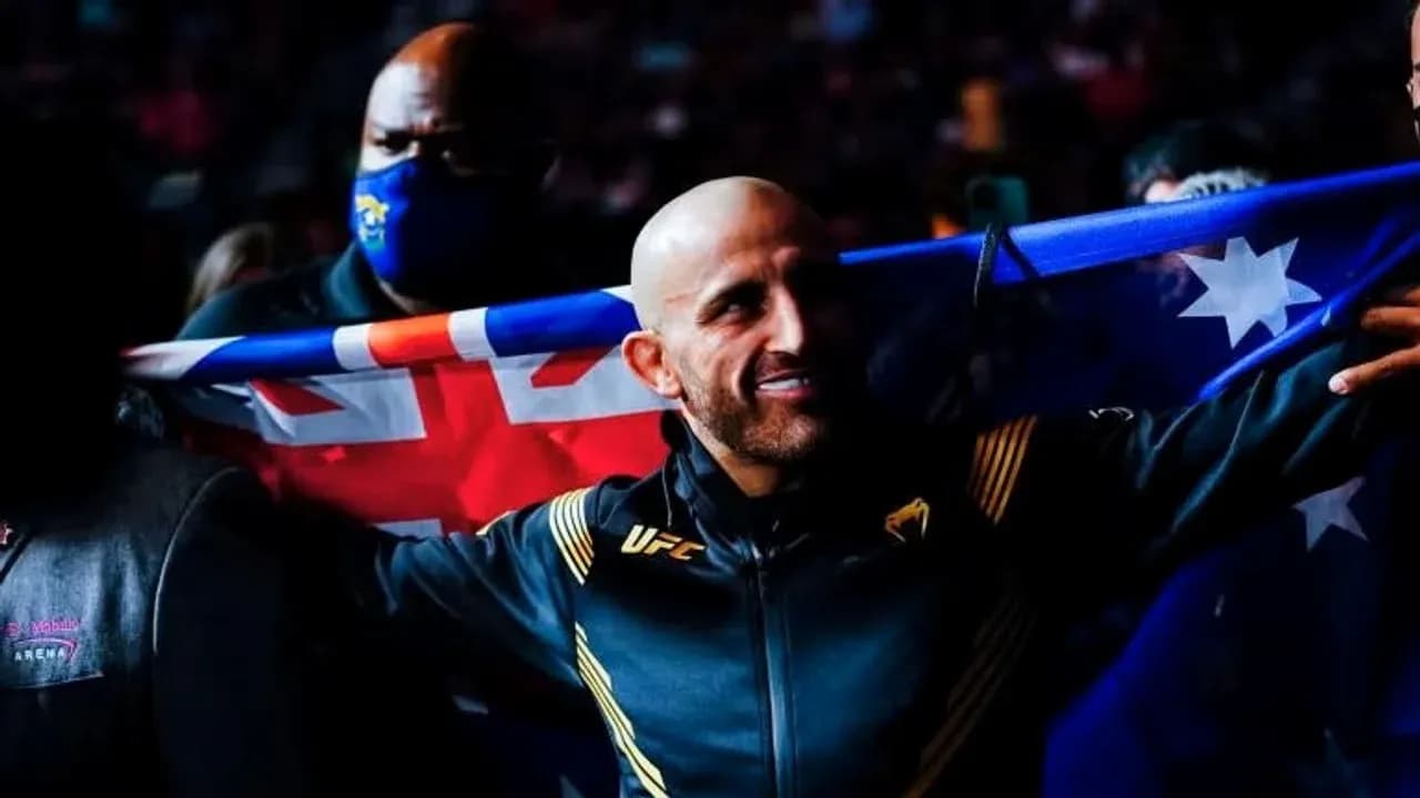 Fighter holding Australian flag before entering the octagon Fighter holding Australian flag before entering the octagon