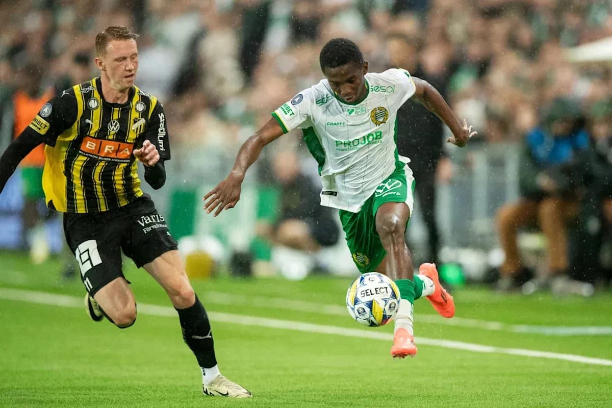 Joueur dribblant avec le ballon pendant le match Joueur dribblant avec le ballon pendant le match