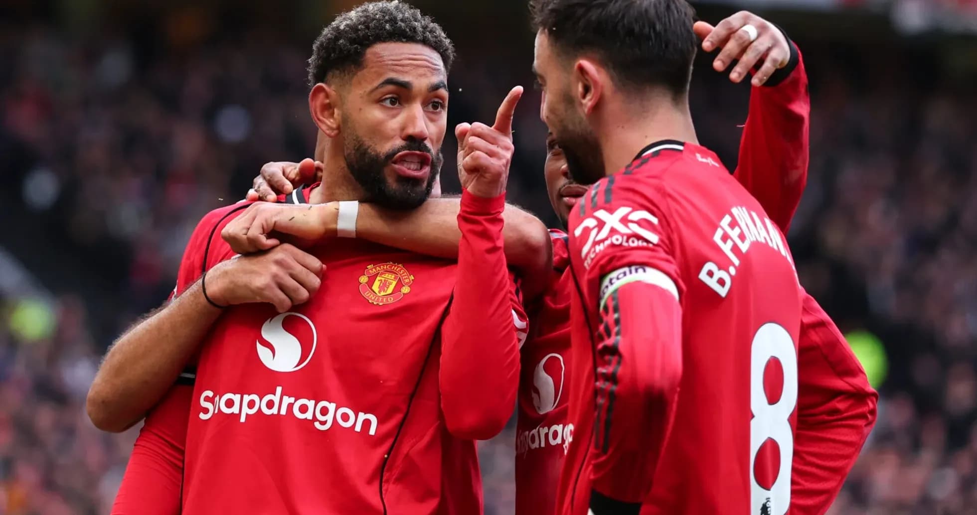 Joueurs de Manchester United célébrant un but ensemble Joueurs de Manchester United célébrant un but ensemble