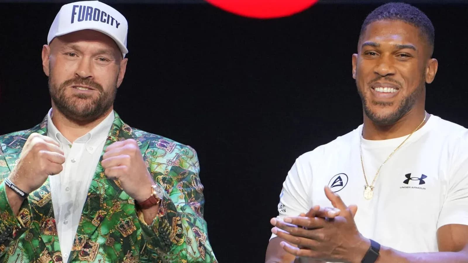 Tyson Fury et Anthony Joshua lors d'une conférence de presse Tyson Fury et Anthony Joshua lors d'une conférence de presse