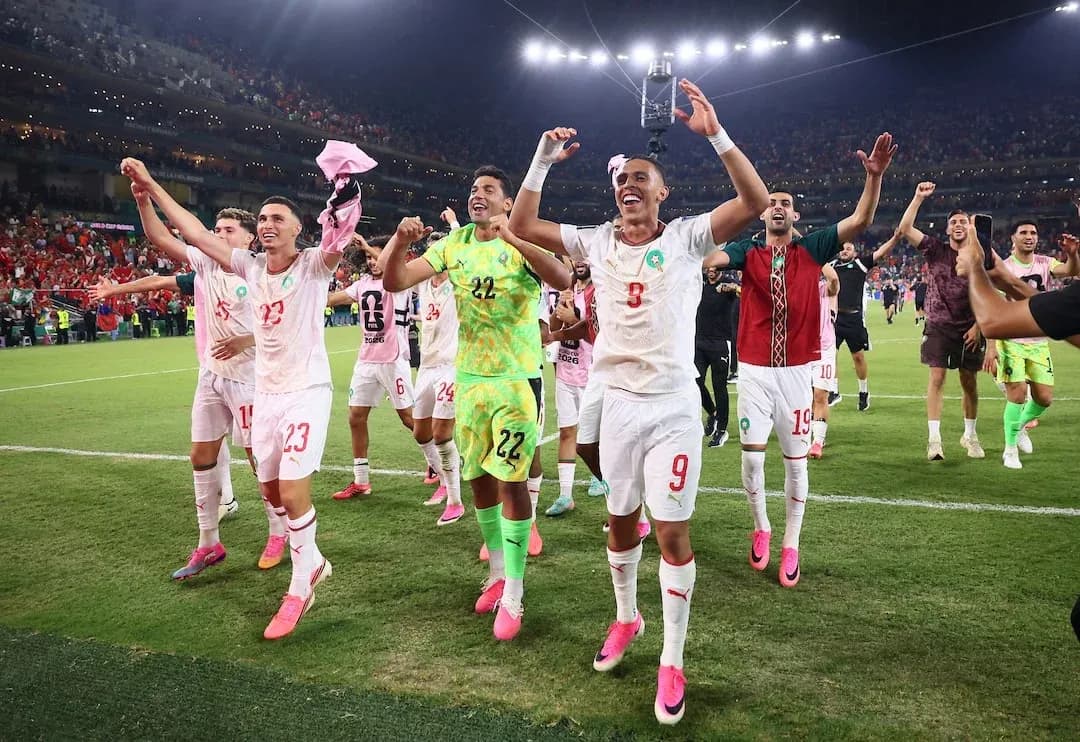 Joueurs marocains célébrant la victoire Joueurs marocains célébrant la victoire