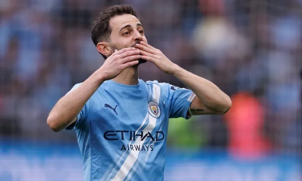Joueur de Manchester City célébrant un but Joueur de Manchester City célébrant un but