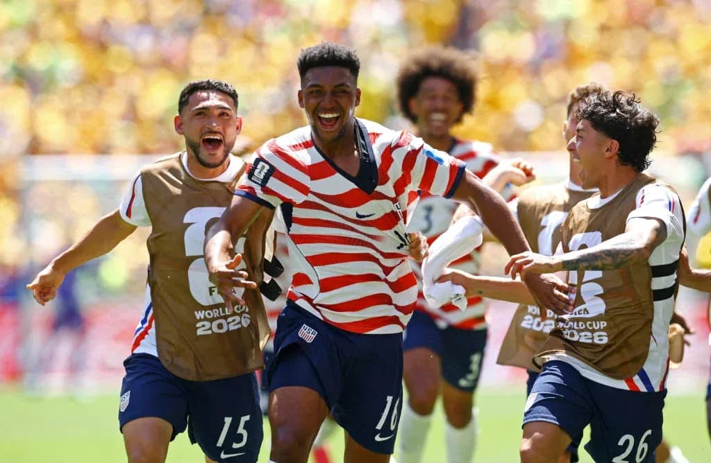 Joueurs américains célébrant un but lors du match Joueurs américains célébrant un but lors du match