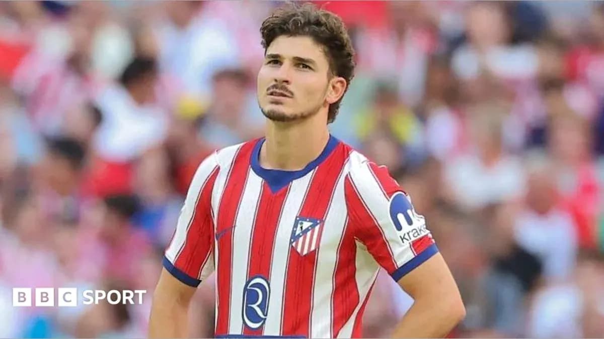 Joueur d'Atlético de Madrid sur le terrain Joueur d'Atlético de Madrid sur le terrain