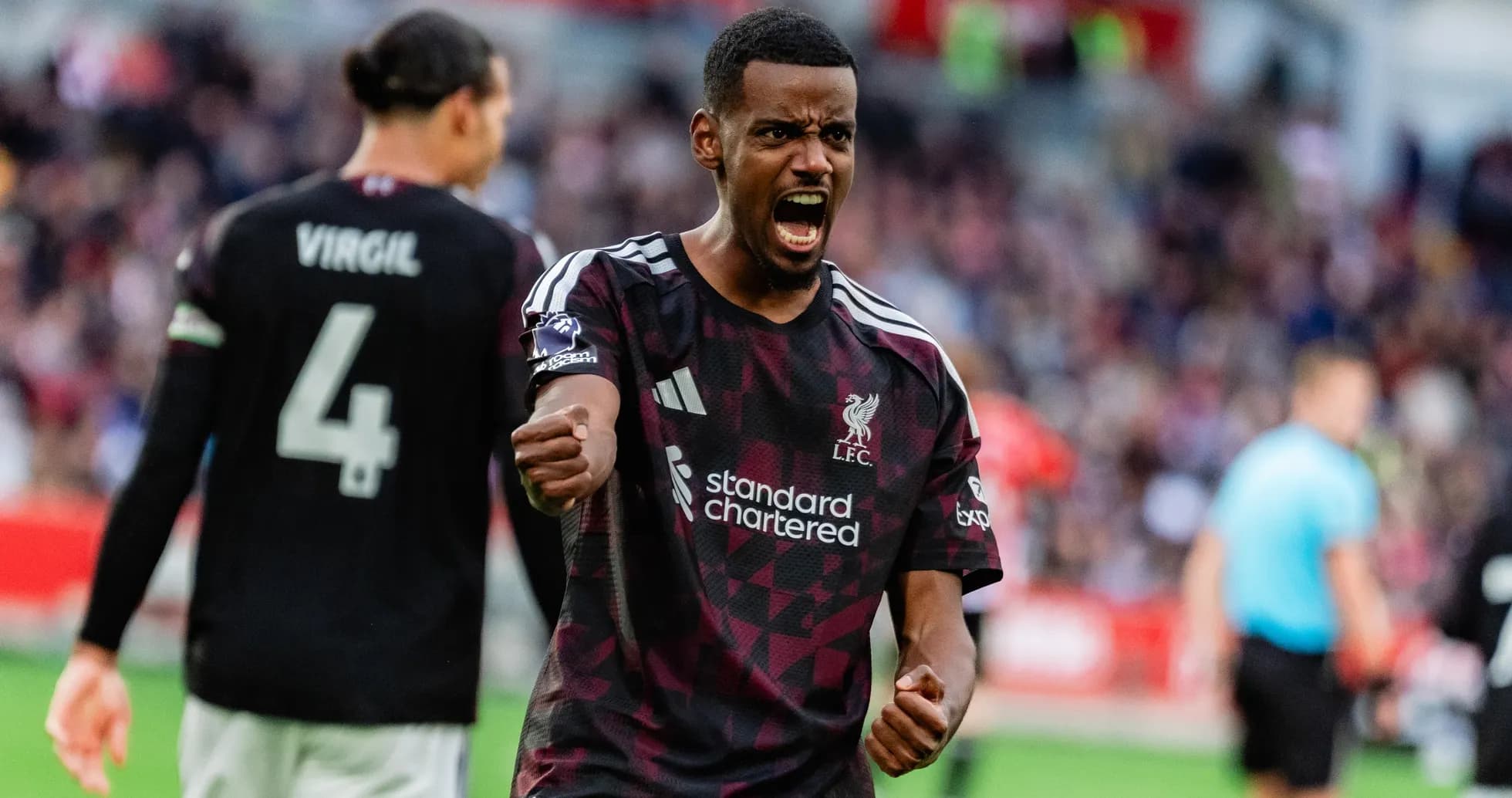 Joueur de Liverpool célébrant un but Joueur de Liverpool célébrant un but