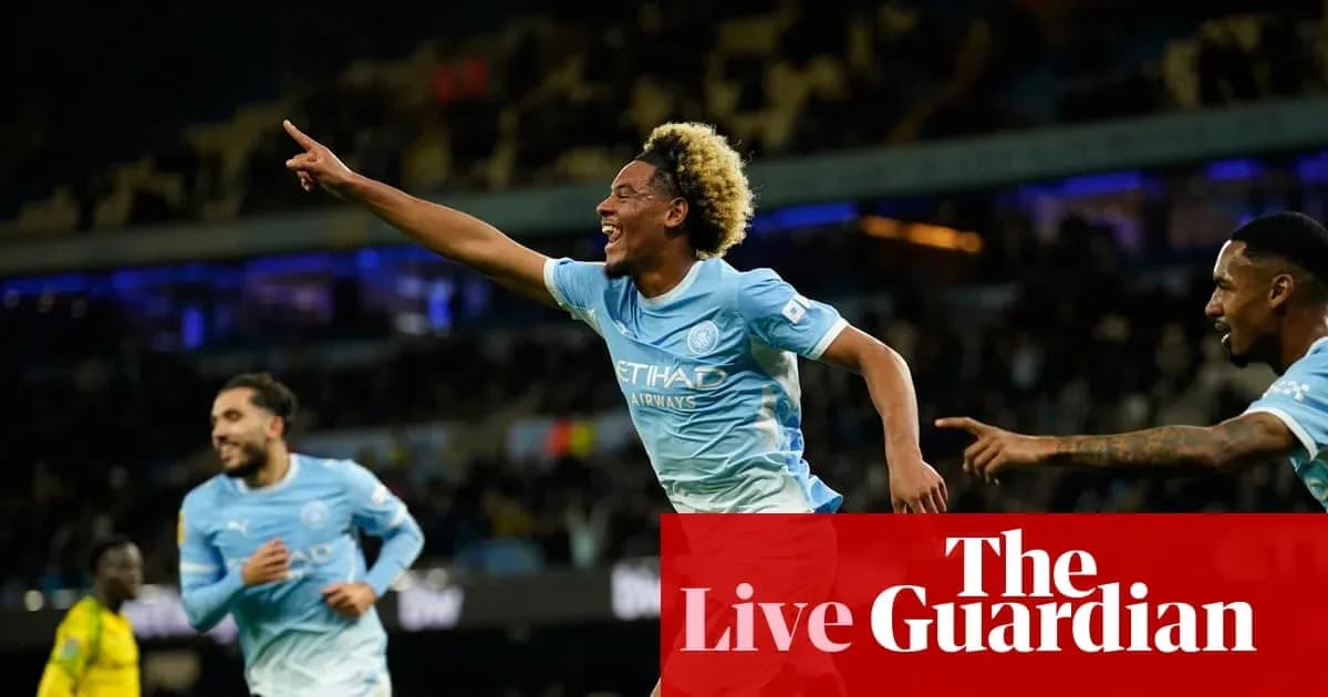 Joueur de Manchester City célébrant un but Joueur de Manchester City célébrant un but
