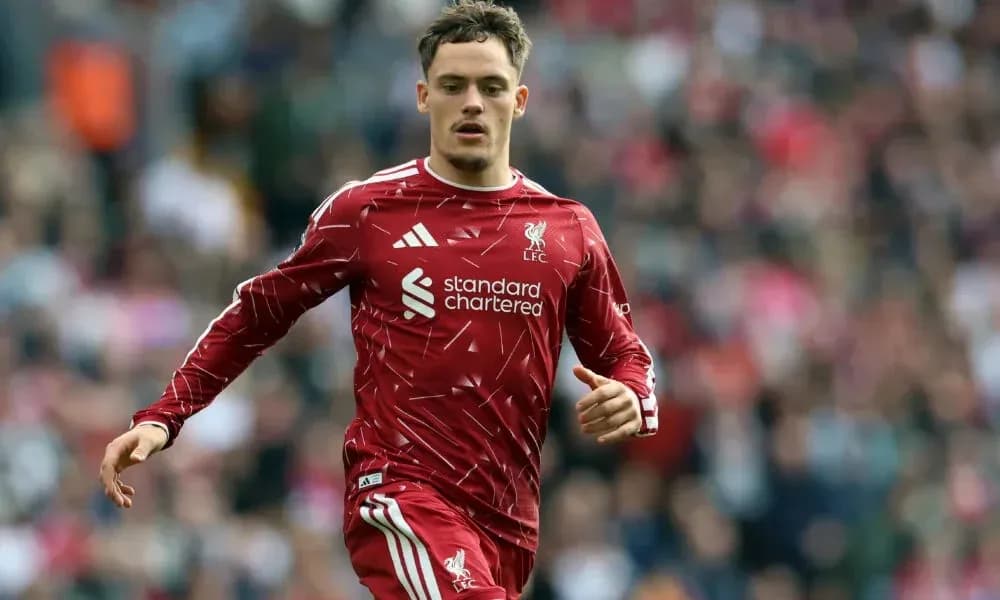 Joueur de Liverpool en action sur le terrain Joueur de Liverpool en action sur le terrain