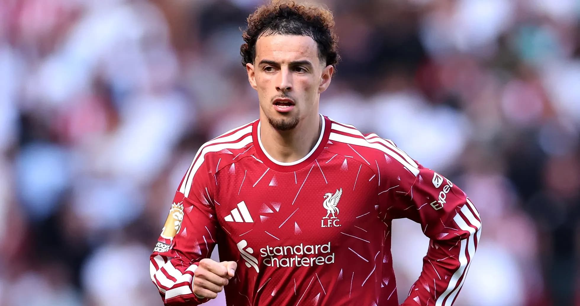Joueur de Liverpool en action sur le terrain Joueur de Liverpool en action sur le terrain