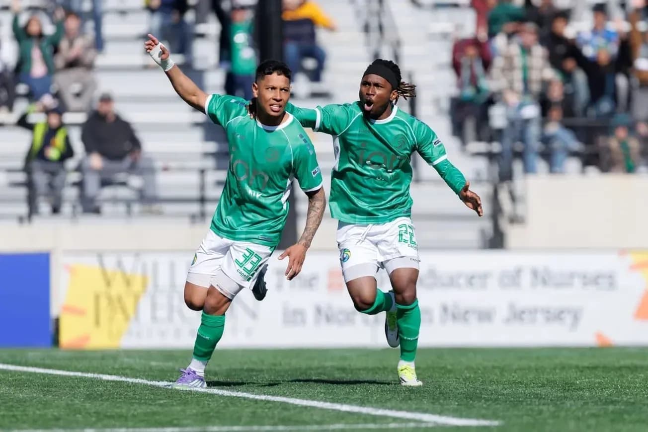 Joueurs célébrant un but lors du match Joueurs célébrant un but lors du match