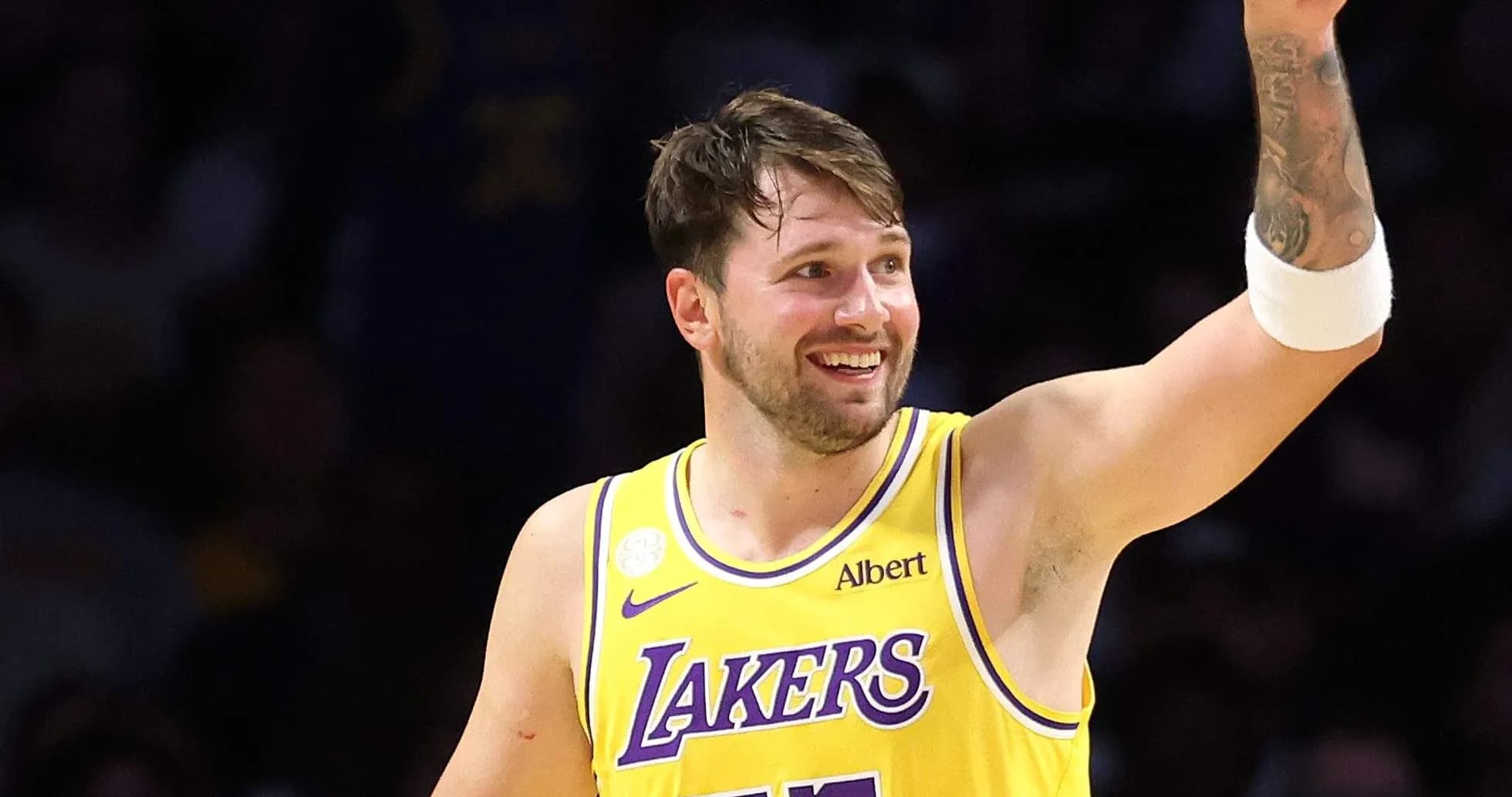 Joueur des Lakers célébrant lors d'un match Joueur des Lakers célébrant lors d'un match